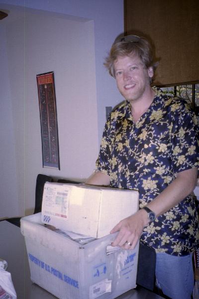 Vernon with the box of mail