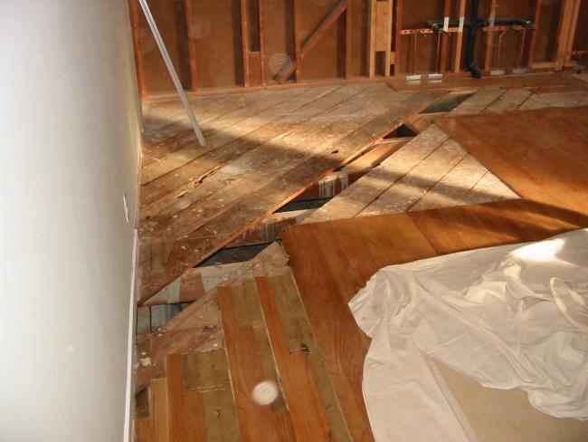 subfloor with diagonal board missing